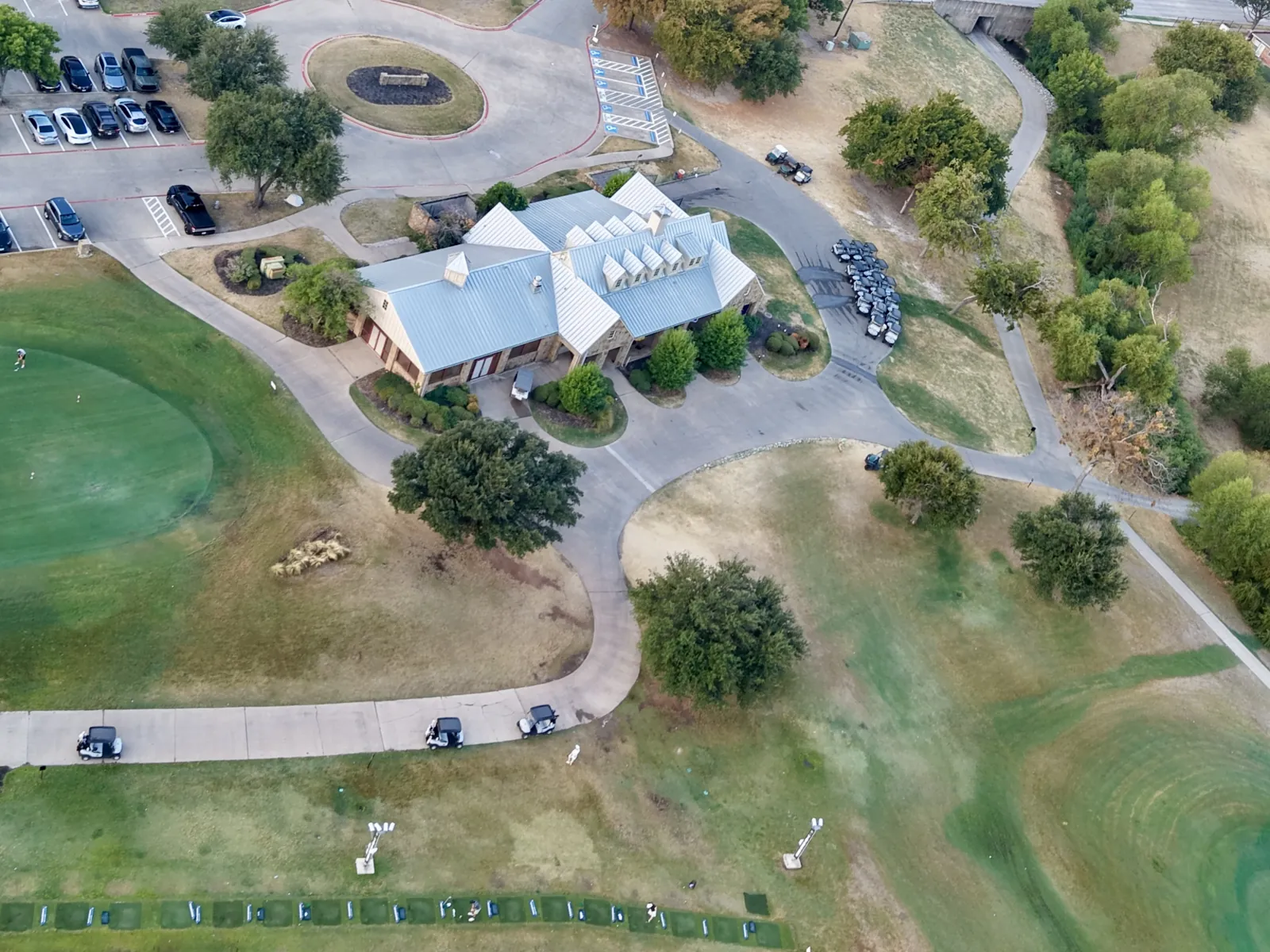 Clubhouse, practice green and range