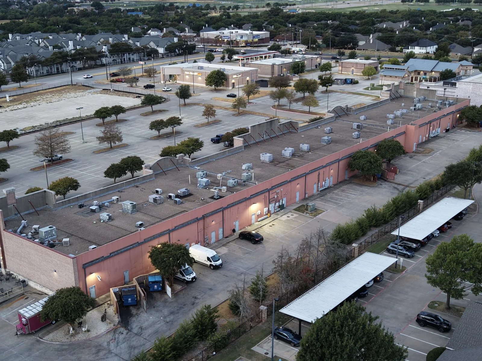 Retail center, rooftops and service lane