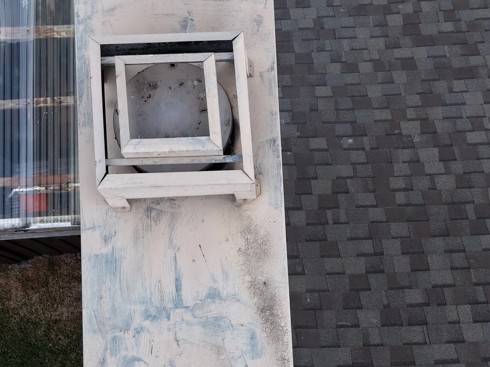 Vent housing and low-slope roof, up close
