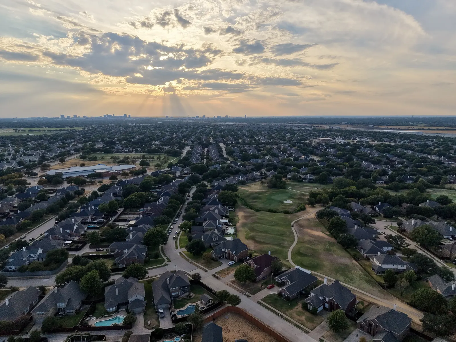 Sun rays over the Dallas skyline
